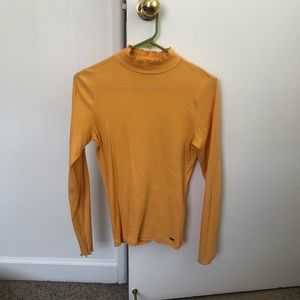 yellow turtleneck
